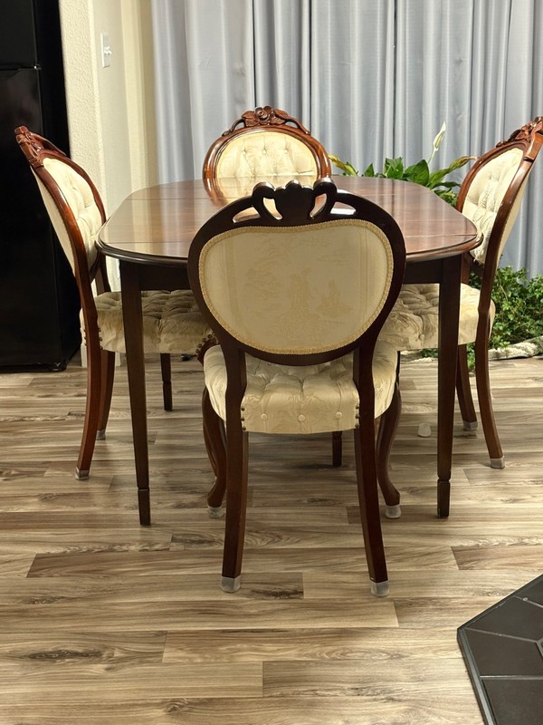 18th Century Classic by Drexel table (expandable 48" to 84") and 8 chairs.