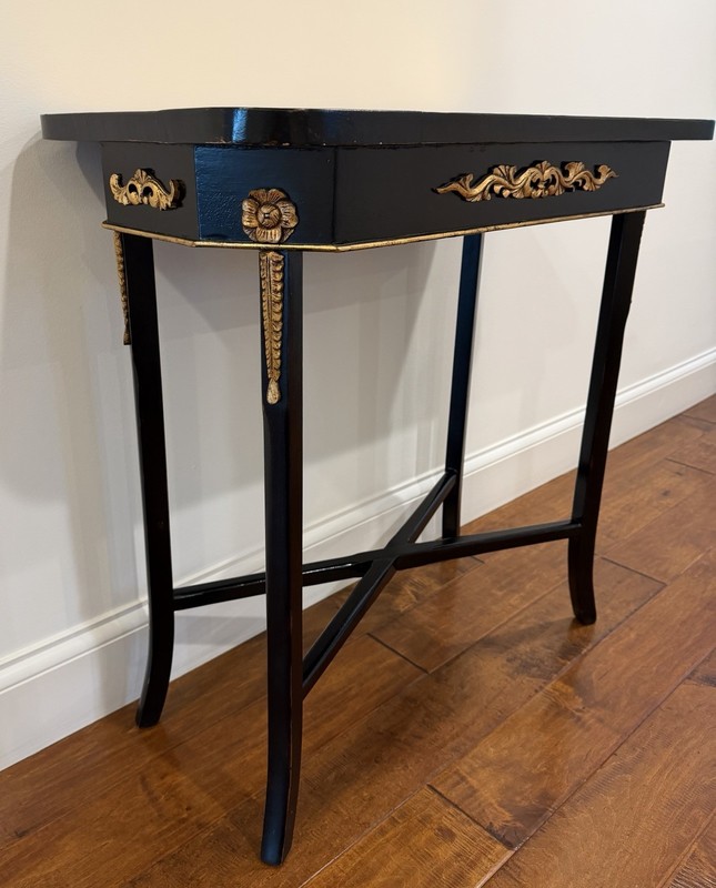 Elegant Black and Gold Console gallery