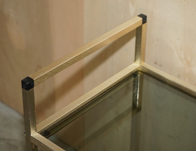 MID CENTURY MODERN GLASS AND POLISHED BRASS CIRCA 1950'S DRINKS TROLLEY gallery