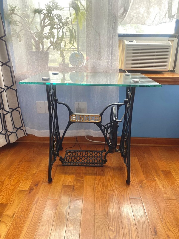 Singer modified table with glass top. gallery