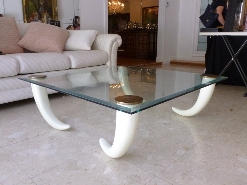 SMASHINGLY CHIC 1970’S GLASS COFFEE TABLE WITH FAUX TUSK LEGS AND BRASS CAPS – P