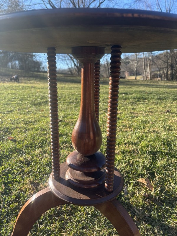 Victorian mahogany circular wine table turned column,tripod base,scrolled feet. gallery