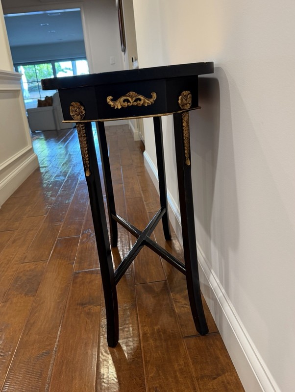 Elegant Black and Gold Console gallery
