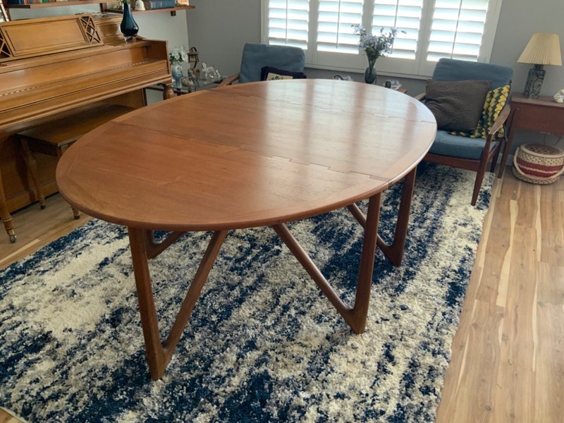 Danish teakwood dining table by designer Niels Kofoed