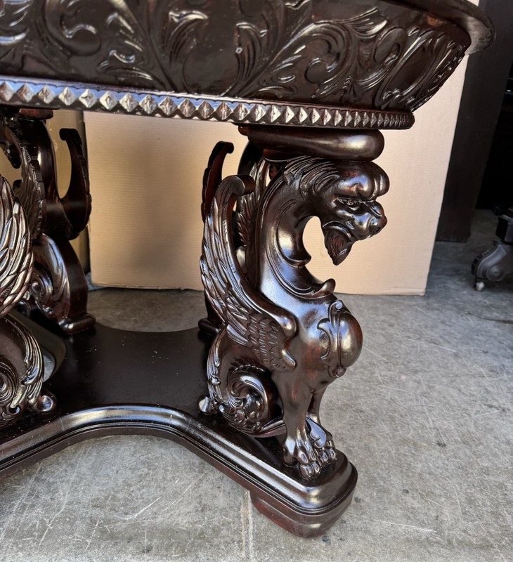 R. J. HORNER CARVED MAHOGANY WING GRIFFIN ROUND CENTER TABLE gallery