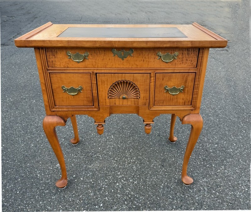 Eldred Wheeler slate-top lowboy in maple and tiger maple in the circa 1750 style