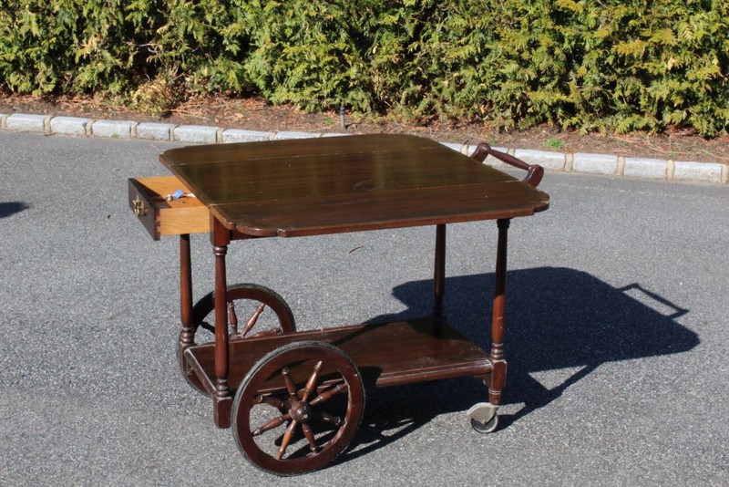 1970’s Tea Cart With Working Drop Leaf Sides, Wheels, And A Locking Drawer +keys gallery