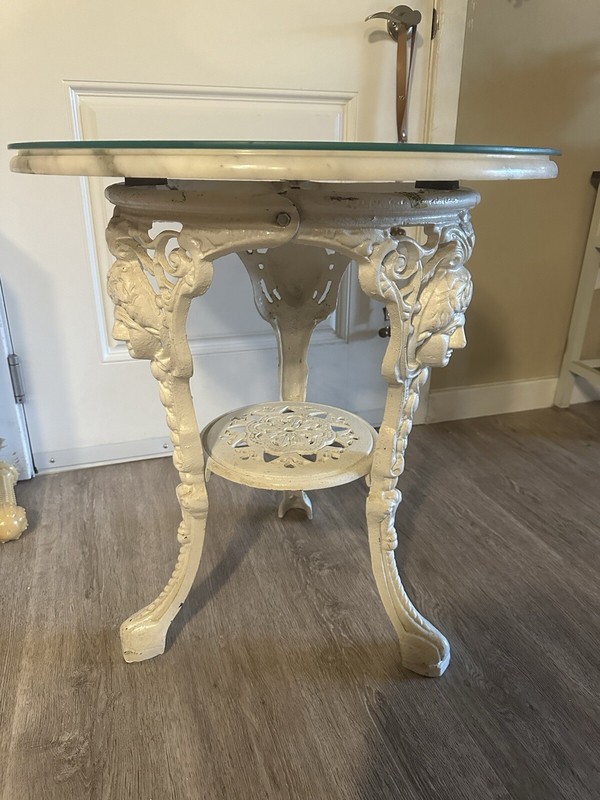 vintage (late 1800’s) cast iron table with thick marble top and glass table top
