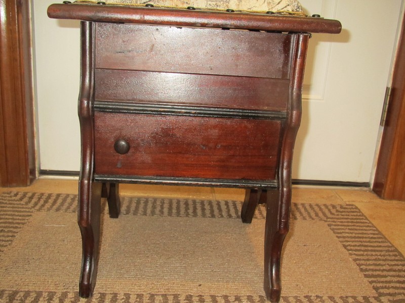 Victorian mahogany upholstered footstool that opens into a shoe shine stand