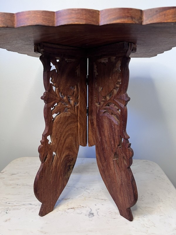 VINTAGE HAND CARVED INDIA WOOD TABLE/FOLDS gallery