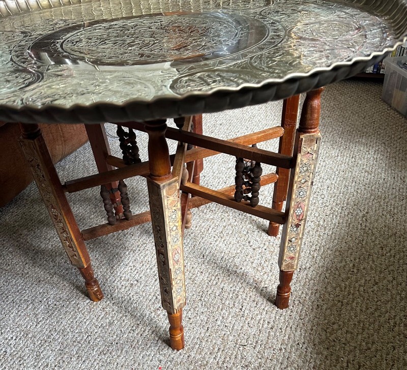 Saudi 36" diameter brass table top with wooden folding base. gallery