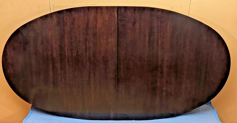 Custom oval shaped dining table with one large leaf Made In Solid Maple Wood