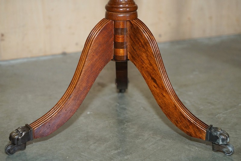 VINTAGE HAND DYED AND AGED BROWN LEATHER OVAL COFFEE TABLE WITH LION CASTORS gallery