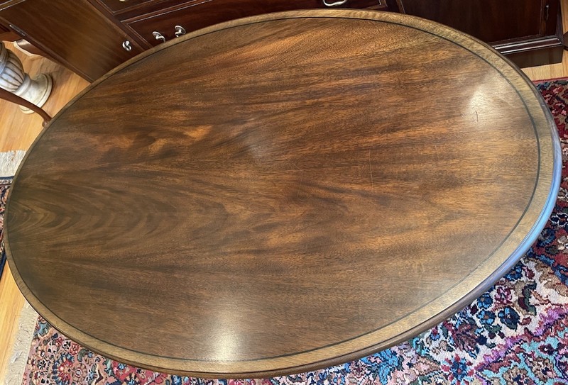 Henkel Harris Oval Mahogany Coffee or Cocktail Table with Brass Lion Claw Caps gallery
