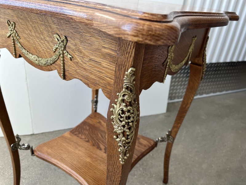 Antique French Louis XV oak accent table with shelf, ormolu and dolphin mounts gallery