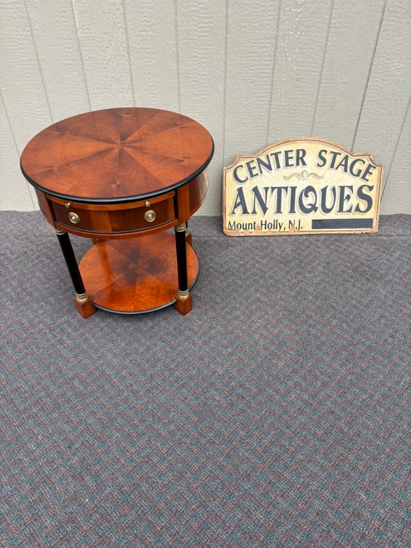 67823 Elegant Century Round Side Table with Cherry Veneer and Brass Accents