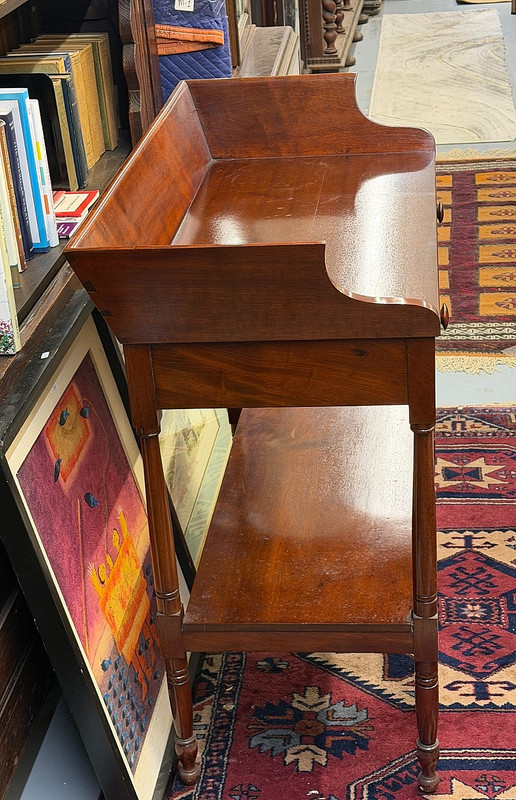 Mahogany side table with canted top rails, American, 1850s, French polish gallery