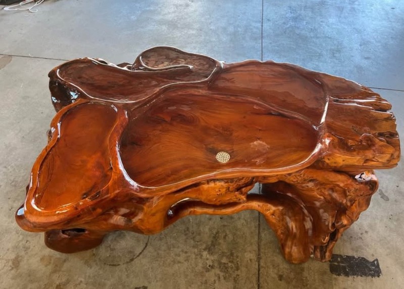 large ceremonial tea table with embedded rock