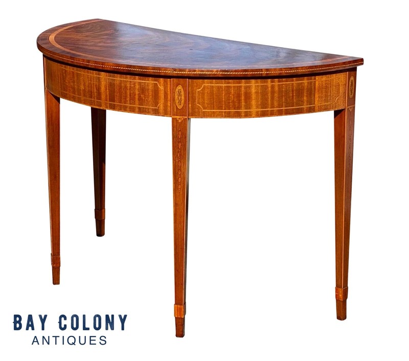 20TH C ANTIQUE MAHOGANY DEMILUNE CONSOLE TABLE WITH SATINWOOD BELLFLOWER INLAYS