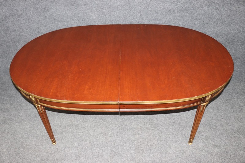 Signed Maison Jansen Brass and Bronze Adorned Mahogany Dining Table with 3 Leave gallery