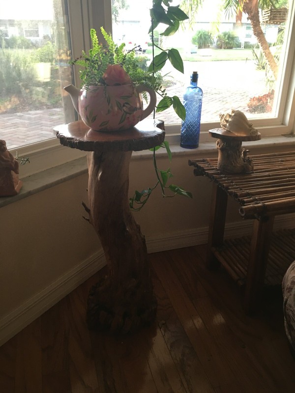 Rustic wood pedestal table