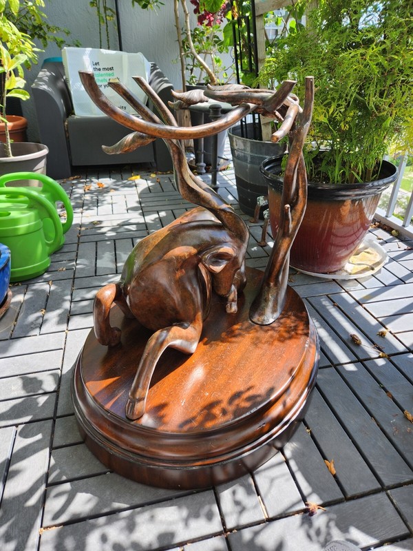 BRONZED GAZELLE TABLE ON WOOD BASE gallery
