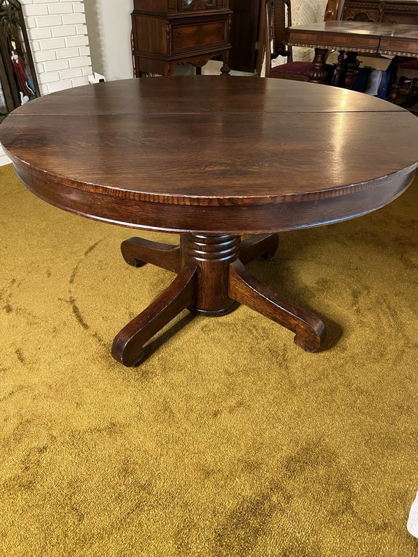 Antique Empire Solid Oak Pedastle Dining Table. 48″ can exp w/ two 12″ leaves.
