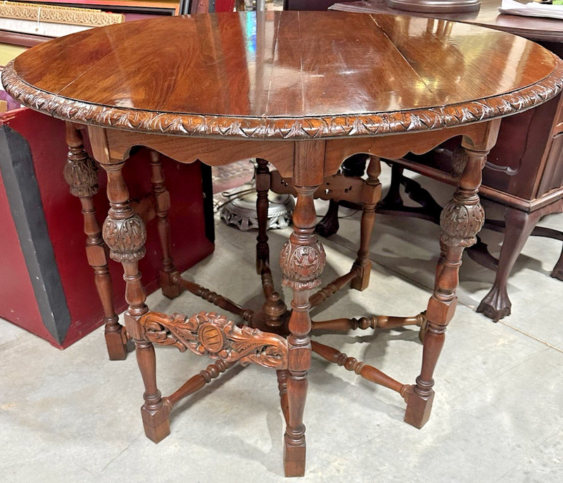 Vintage Barnard & Simonds Round Table With Carved Legs And Spindle Wheel Base