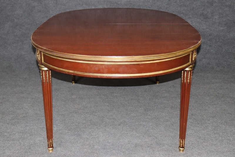 Signed Maison Jansen Brass and Bronze Adorned Mahogany Dining Table with 3 Leave gallery