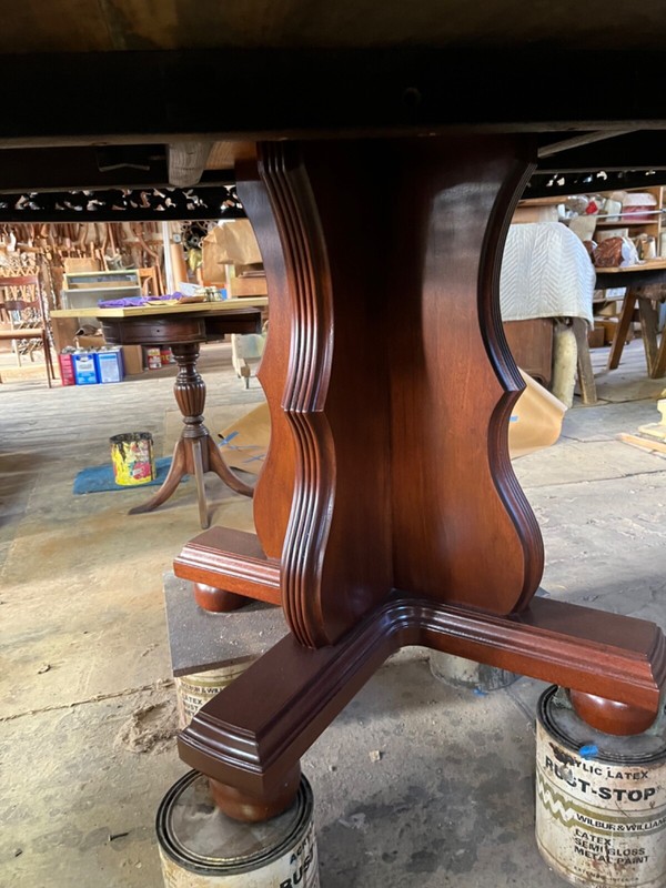 Antique 60" Round Table with hand carved apron gallery