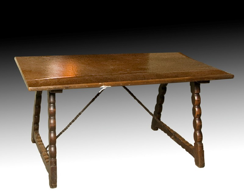 Walnut dining table with wrought iron fasteners. 18th century