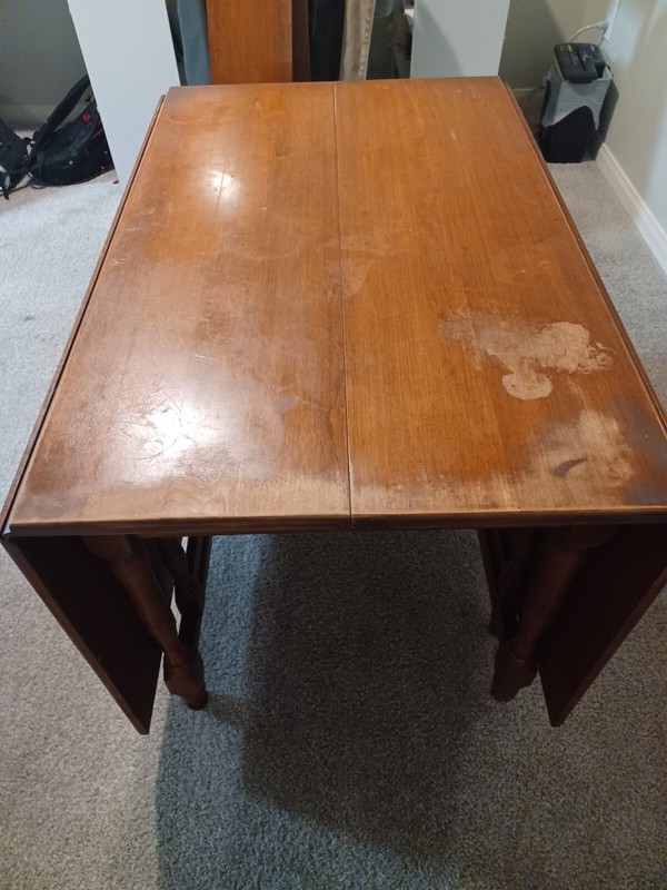 Beautiful original 1957 Walter of Wabash drop leaf table. Comfortably seats 10