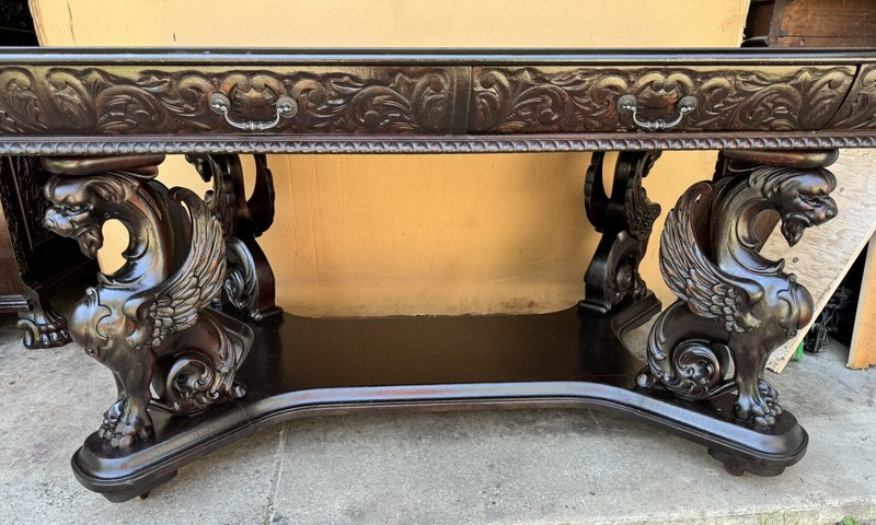 R. J. HORNER CARVED WINGED GRIFFIN LIBRARY TABLE gallery