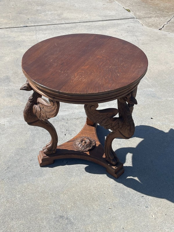 Early 1900s Carved Wooden Center or Coffee Table with 3 Bird Support Arches