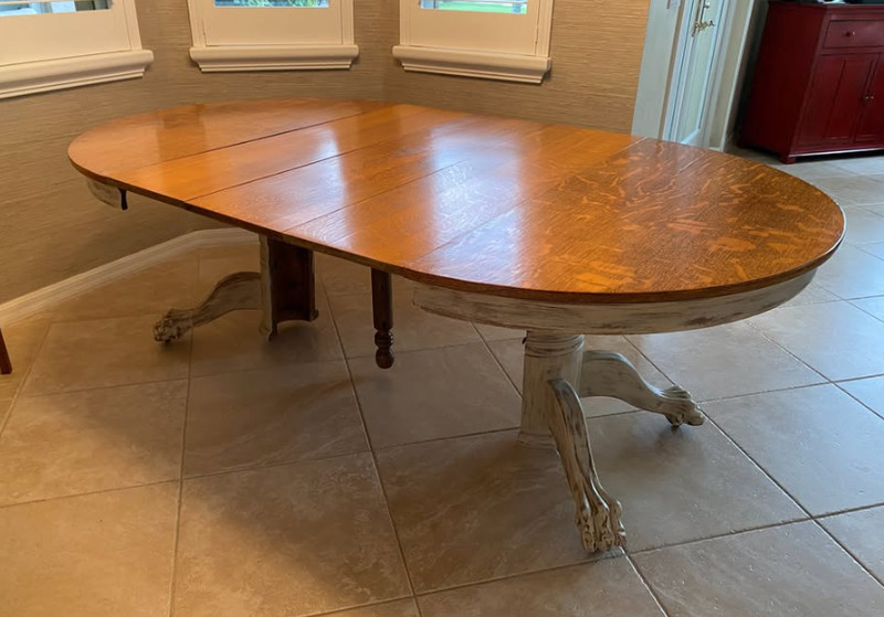 Dining table in Vintage Tiger Oak. 48" wide with three 12" leaves. Veneer top. gallery