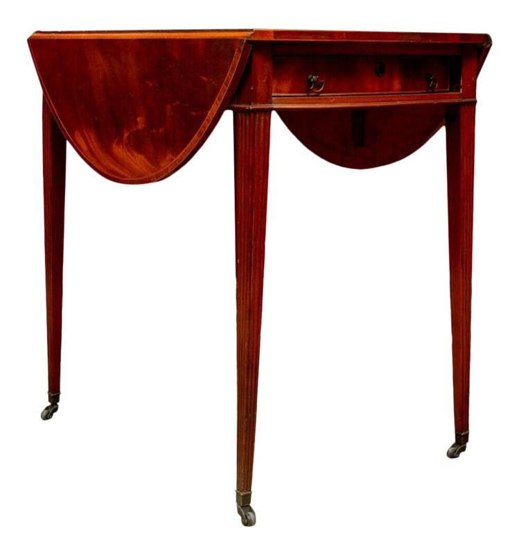 Flame Mahogany Oval Pembroke Table With Banded Inlay On Casters