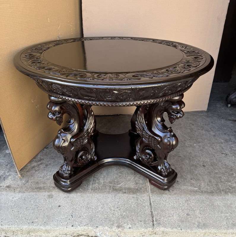 R. J. HORNER CARVED MAHOGANY WING GRIFFIN ROUND CENTER TABLE