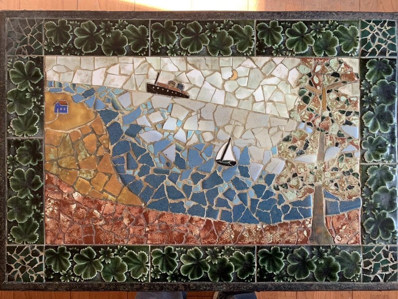 Antique Wrought iron and Tile Top Mosaic Table with One of Kind Sailboat Items