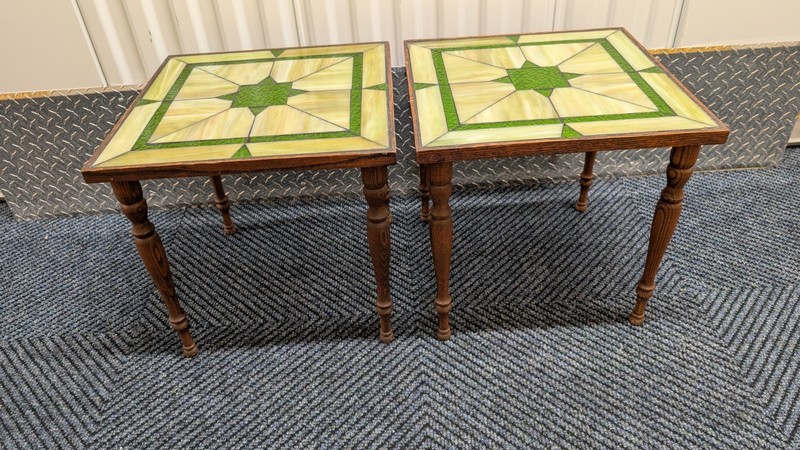 Mission or Arts & Crafts style oak end tables featuring a green slag glass top