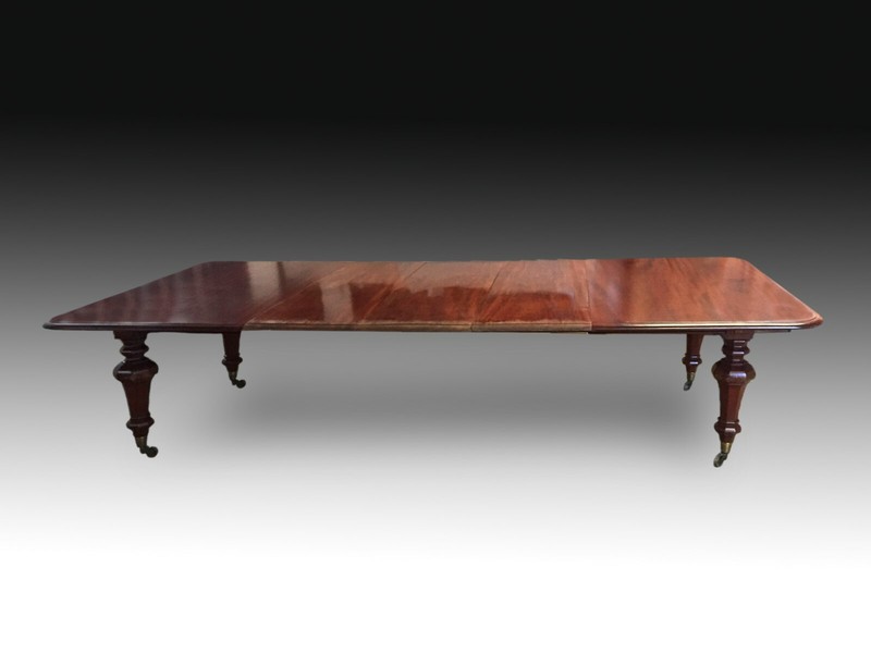 Mahogany and Metal Extensible Dining Table. England, 19th Century