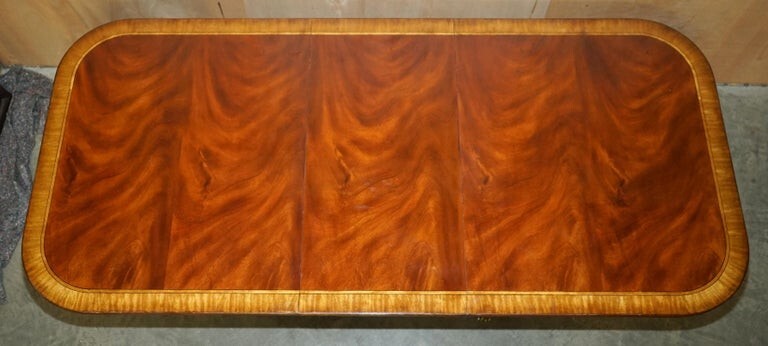 Flamed Mahogany & Walnut Based Tripod Extending Dining Table Brass Castors gallery