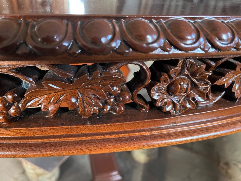 Antique 60" Round Table with hand carved apron gallery