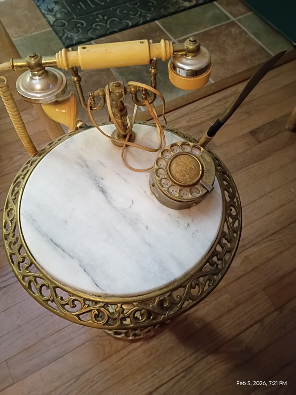 Mid 20th century vintage marble and ornate brass telephone table with attached r