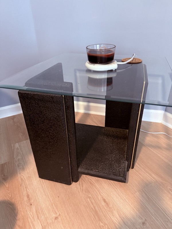 Black with gold trimmings vintage 80s coffee tables with glass top