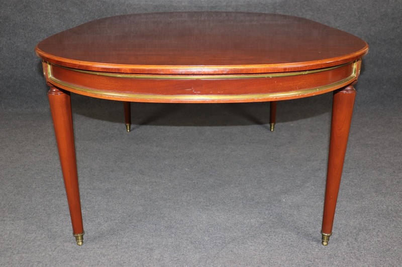 Superb French-Made Maison Jansen Attributed Brass Mounted Mahogany Dining Table gallery