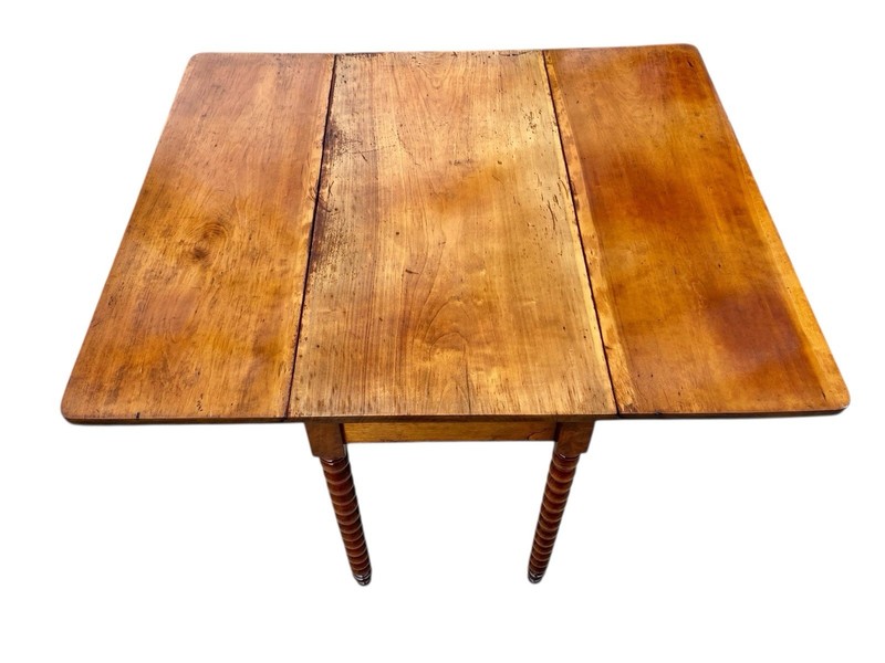 Antique Sheraton Southern Cherry Drop Leaf Table With Spool Turned Legs gallery