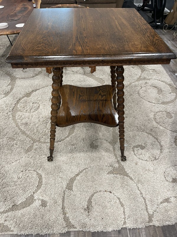 Antique tiger oak parlor side table W/brass and crystal ball feet Nice Condition