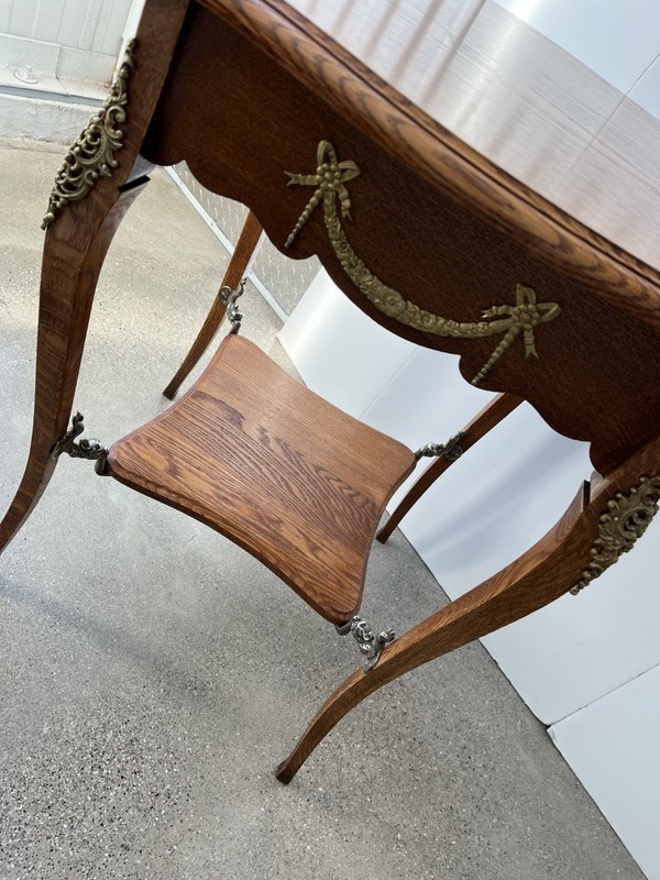 Antique French Louis XV oak accent table with shelf, ormolu and dolphin mounts gallery
