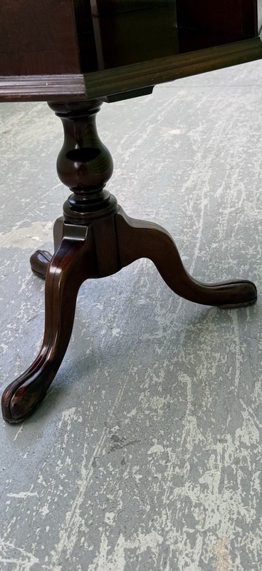 Mahogany octagonal revolving bookcase table with Queen Anne-style cabriole legs gallery