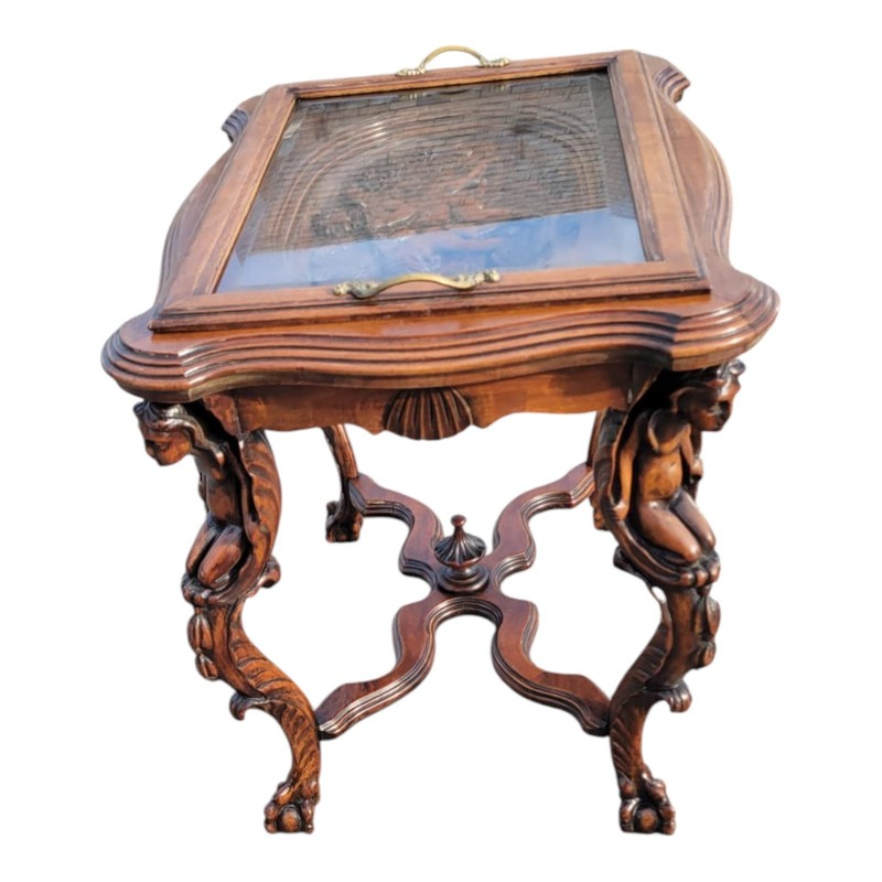 1920 Ornate Carved Angel coffee Table with Glass Top and Sculptural Legs gallery
